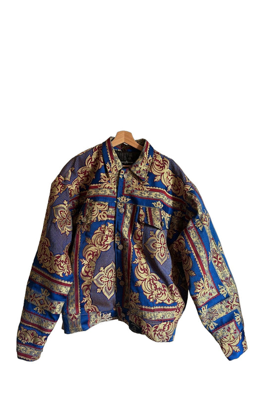 Anouri Blue Jacket with Red & Yellow Details – Vorderansicht am Bügel